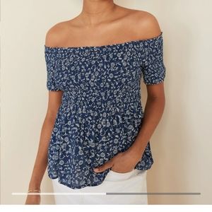 Floral Print
Off the shoulder Smocked blue shirt